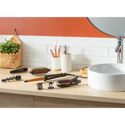 Маша Rowenta CF4231F0 Multi Styler Infinite looks 14 in 1, conical, monotemp, accessories: conical curling wand, 2 in 1 straightening and crimping plates, eliptic waving wand, cool tip, pouch, heating indicator, heat-up time 60s, hanging loop
